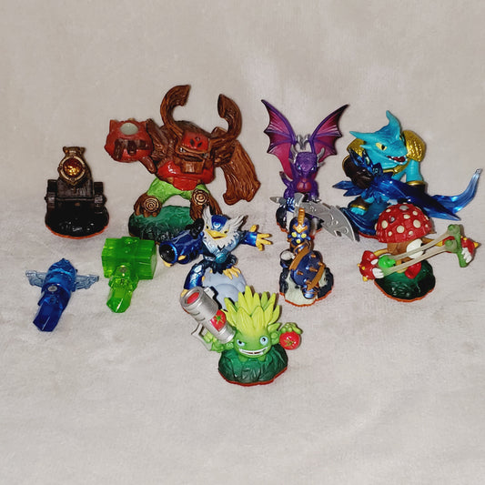 Skylanders Bundle. 7 Figurines w/ Accessories. Snap Shot, Tree Rex & More