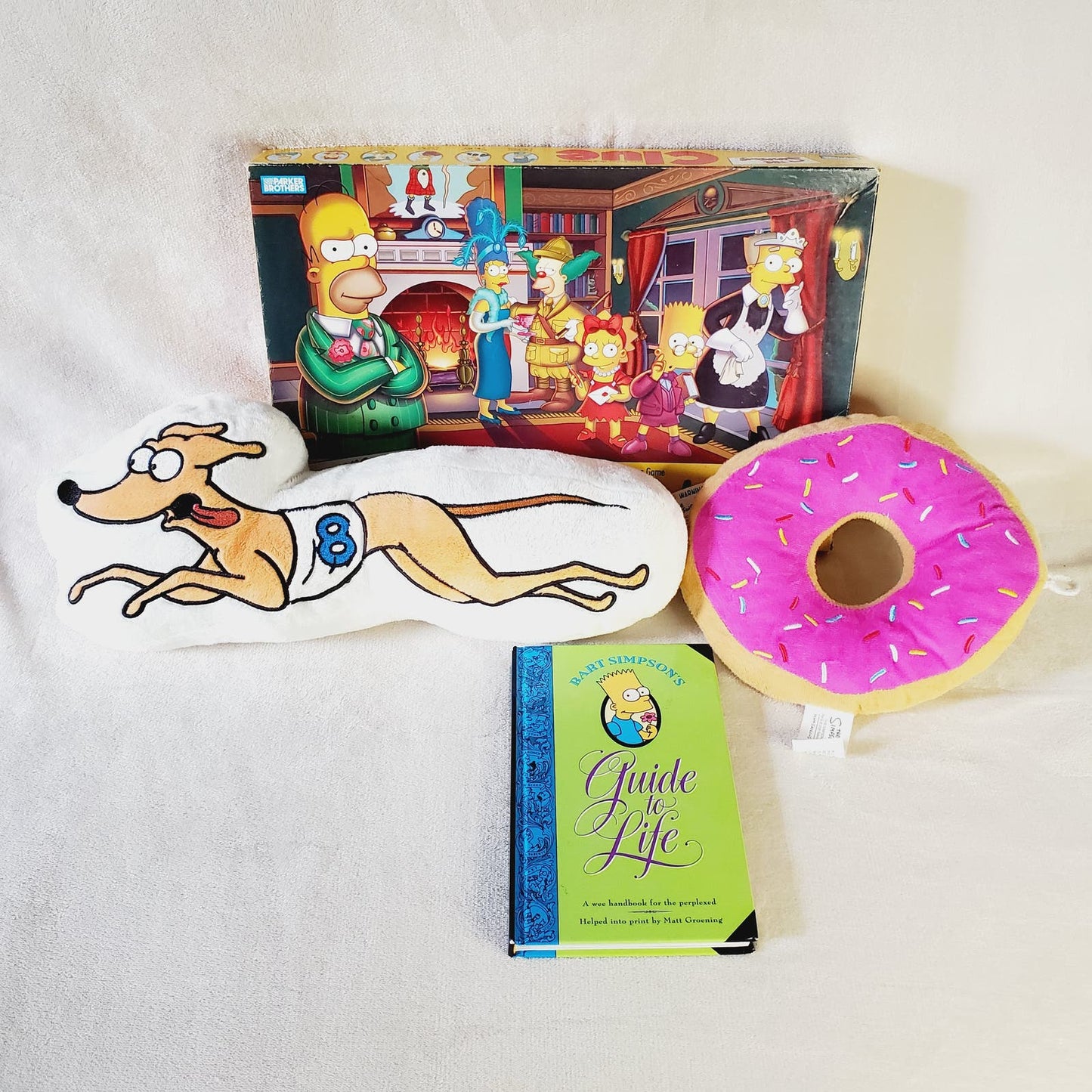 Simpsons Bundle. Simpsons Clue, Universal Plushes, Bart's Guide to Life Hardback